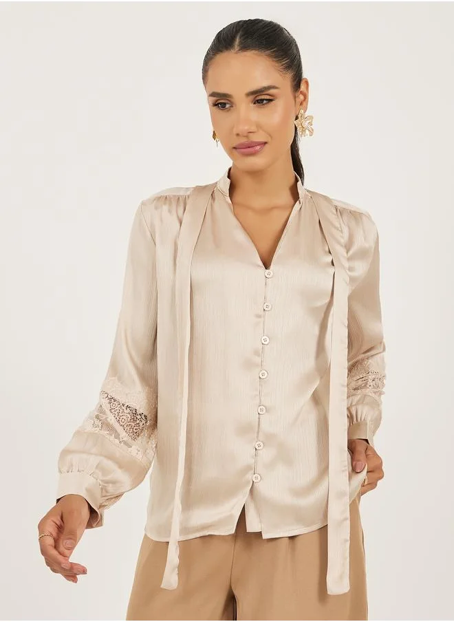 ستايلي Styli Lace Insert Tie-Up Neck Buttoned Blouse