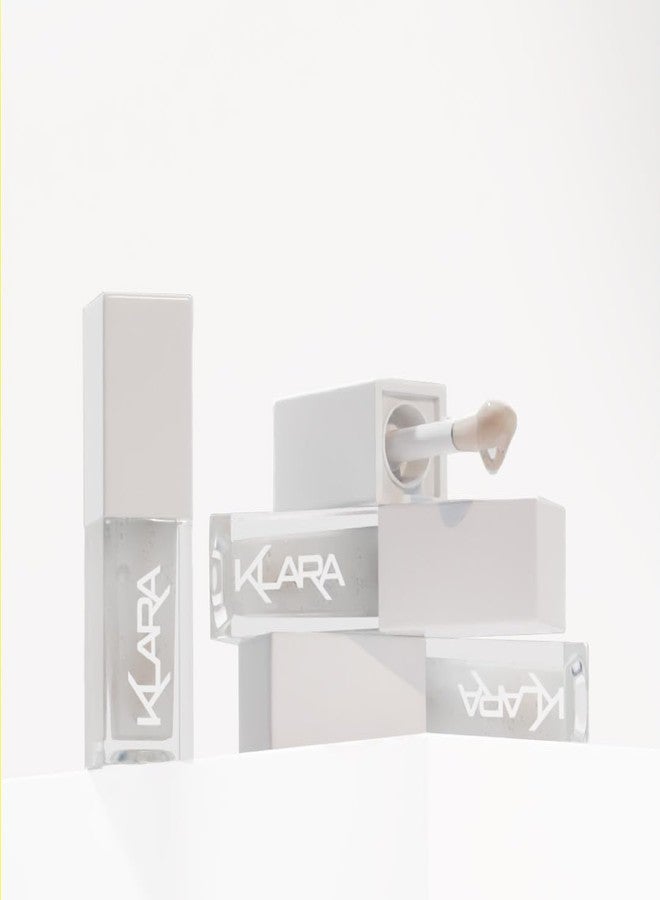 كلارا لمستحضرات التجميل زيت ترطيب الشفاه من كلارا كوزمتكس - زيت مرطب للشفاه لتغذية الشفاه ومنحها لمعانًا جذابًا - مكياج شفاه غني بحمض الهيالورونيك وفيتامين هـ - برائحة جوز الهند - 0.2 أونصة - Image 2