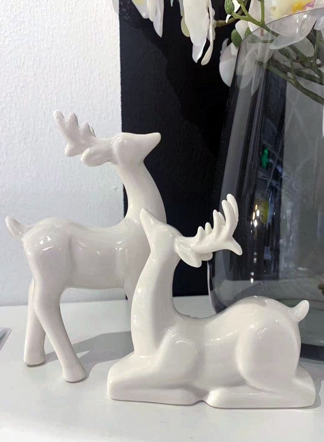 KiaoTime Porcelain Christmas Reindeer Figurines, Pack 2 Mini Animal Reindeer Decor Deer Statues Sculpture Tabletop Ornaments for Cabinet Mantel Shelves Fireplace Home Décor Accents Collectible Figurines - Image 5