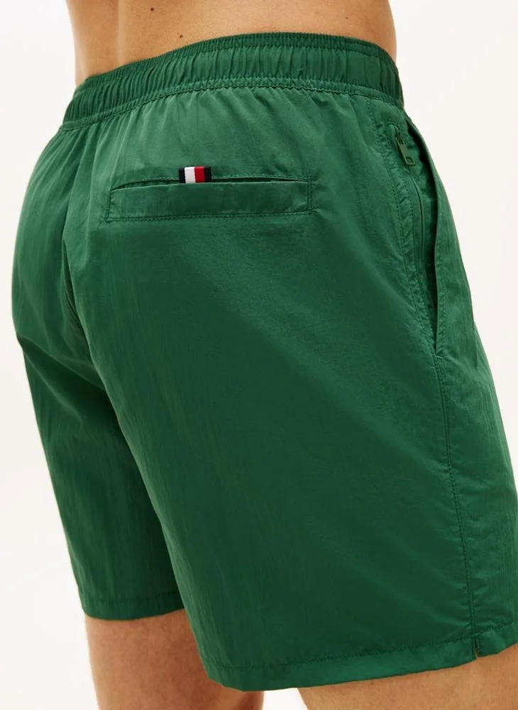TOMMY HILFIGER  Original Logo Mid Length Swim Shorts for Men | Best Price UAE
