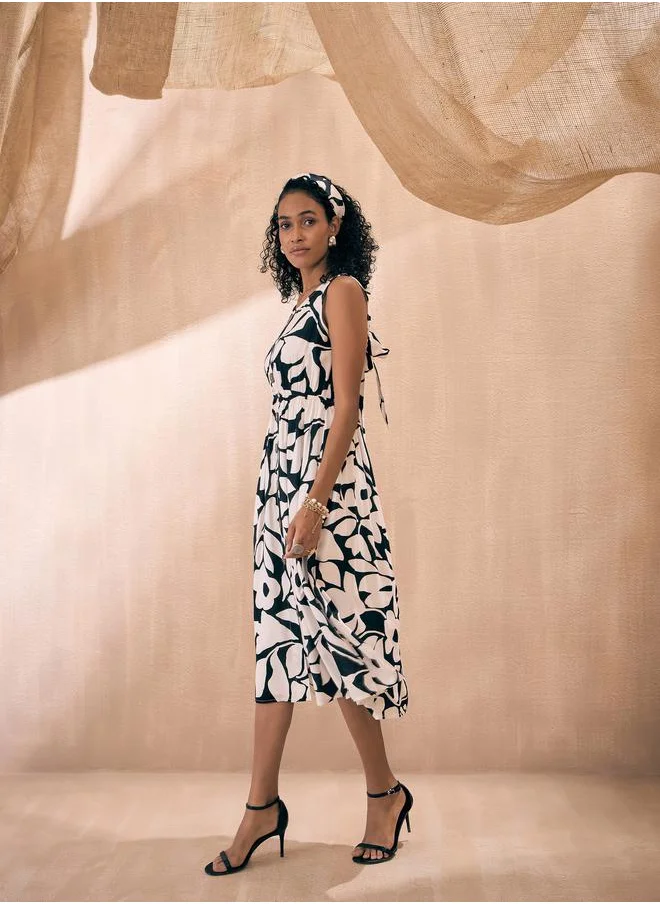 SASSAFRAS Floral Print Front Button Midi Dress by Styli