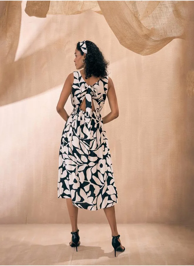 SASSAFRAS Floral Print Front Button Midi Dress by Styli