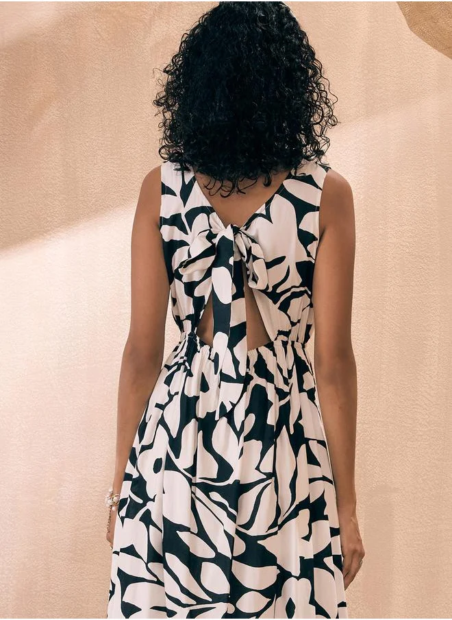 SASSAFRAS Floral Print Front Button Midi Dress by Styli