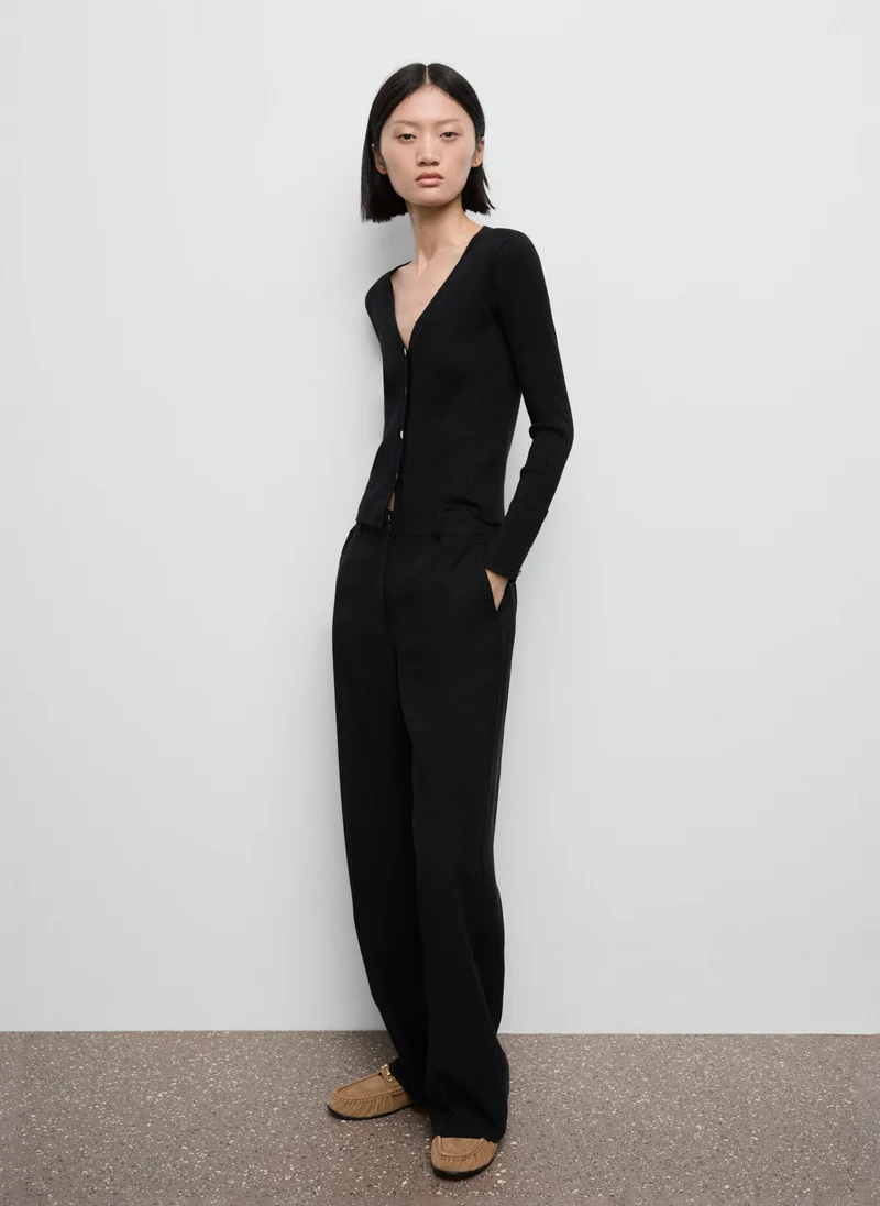 مانجو كارديجان بأزرار مضلع