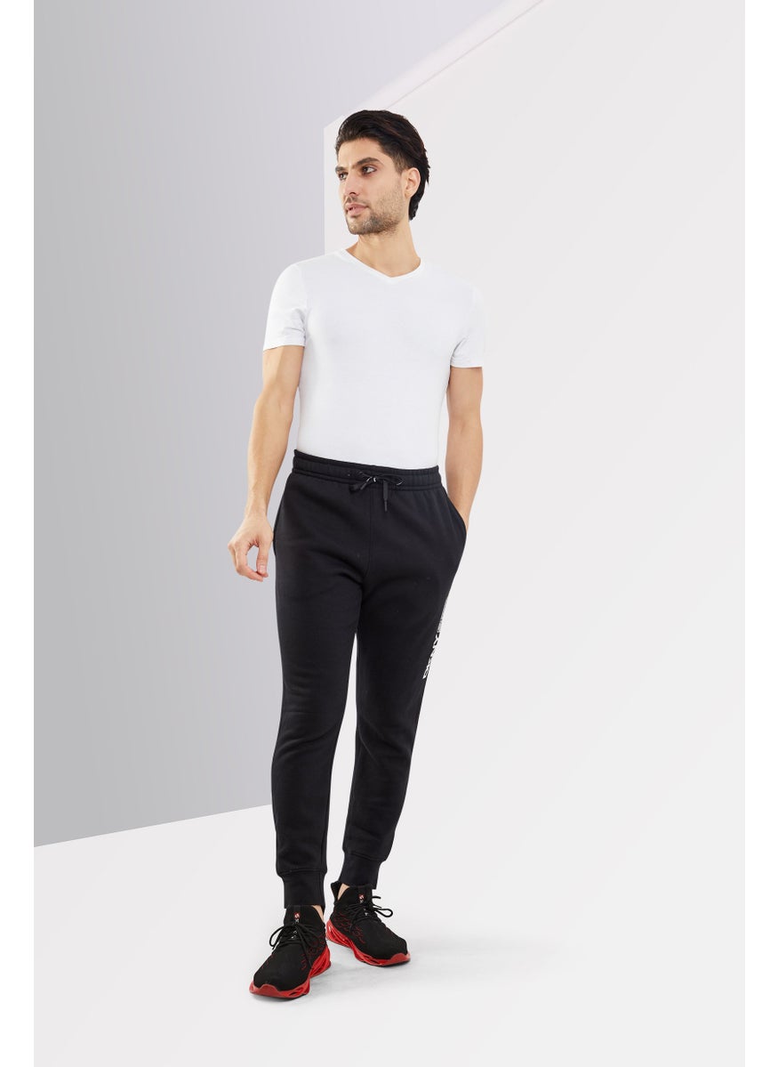 DKNY Sport Men Sportswear Fit Brand Logo Outdoors Jogger Pants, Black  - Image 2