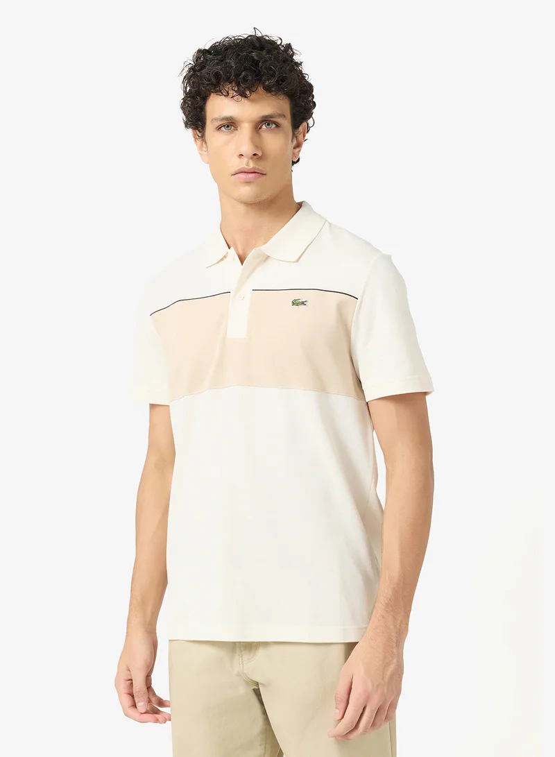 لاكوست بولو قطن ميني بيكيه بقصة عادية وألوان متداخلة