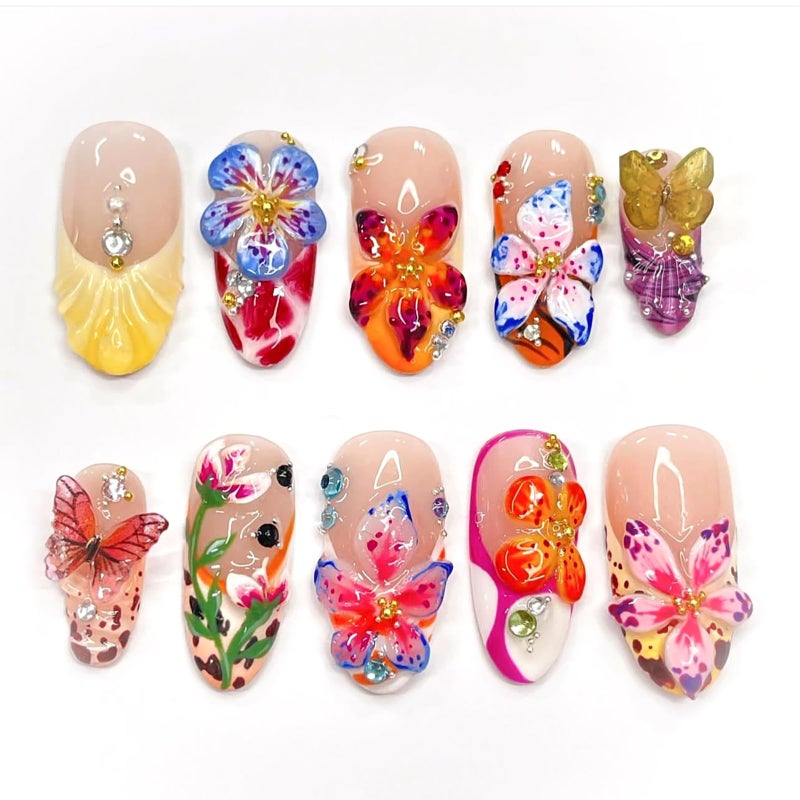 HOSAILY 3D Flower Summer Press on Nails Medium Almond, 24pcs Colorful Butterfly Floral Design Pretty Beach Vacation Nails for Women, Glossy Gold Beads Rhinestones Charms French Tip Glue on False Nails - Image 1