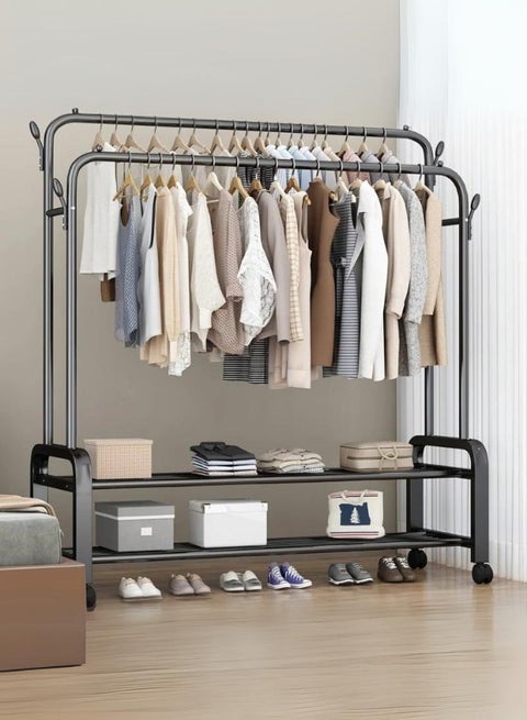 Two-tier iron hanger with two shelves and hangers on wheels