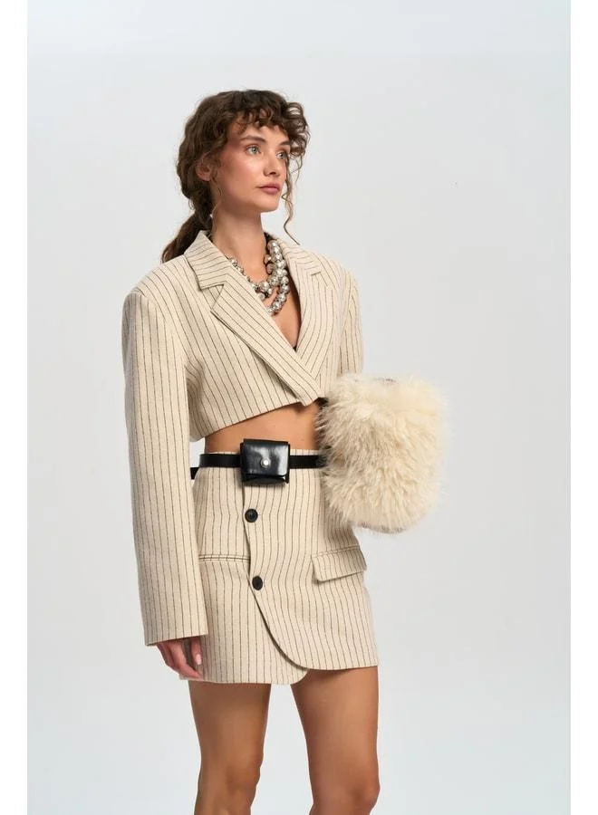 Elegant Beige Jacket and Skirt Set.