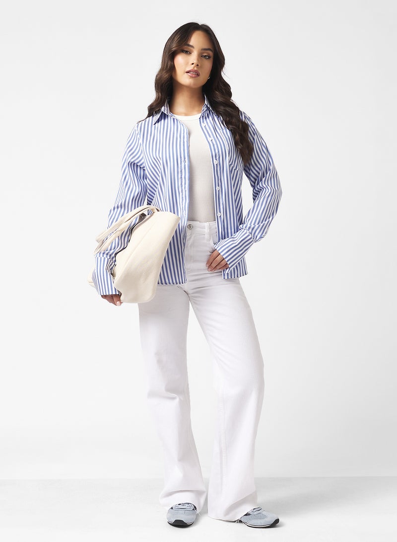 قميص بأزرار مخططة