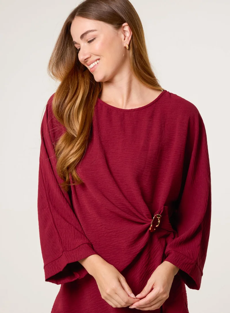 بلو فانيلا بلوزة بتفاصيل جانبية مجعدة