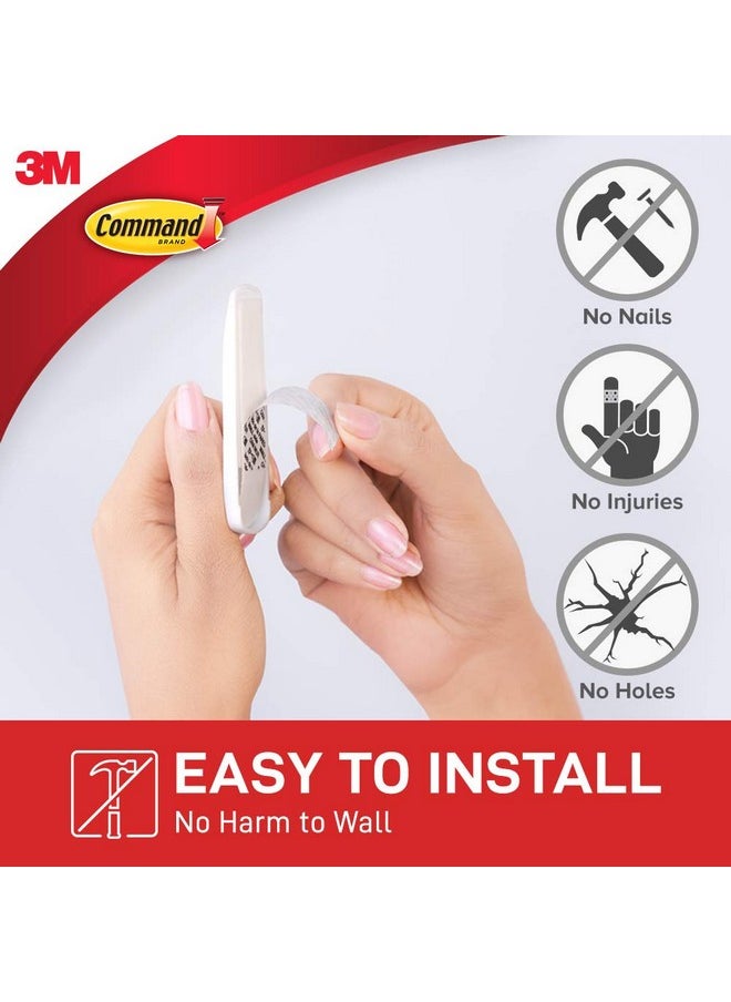 Command Plastic Medium Utility Wall Hooks, Up To 1.3Kg, Heavy Duty, Holds Strongly, Reusable, Adhesive Hooks For Wall, Multi-Surface Damage Free Hooks For Hanging (White, 2Hooks, 4 Stripss)  - Image 3