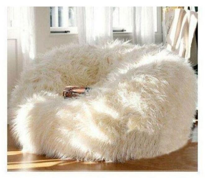 The elegant fur pouf combines maximum comfort with a luxurious look, making it a perfect addition to any home. Beige color.