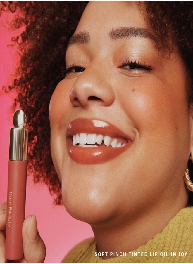 Rare Beauty "Rare Beauty by Selena Gomez Soft Pinch Tinted Lip Oil Stain - Joy (Muted Peach, 3ml) - Hydrating, Lightweight, and Long-Lasting Lip Tint with a Glossy Finish"  - Image 4