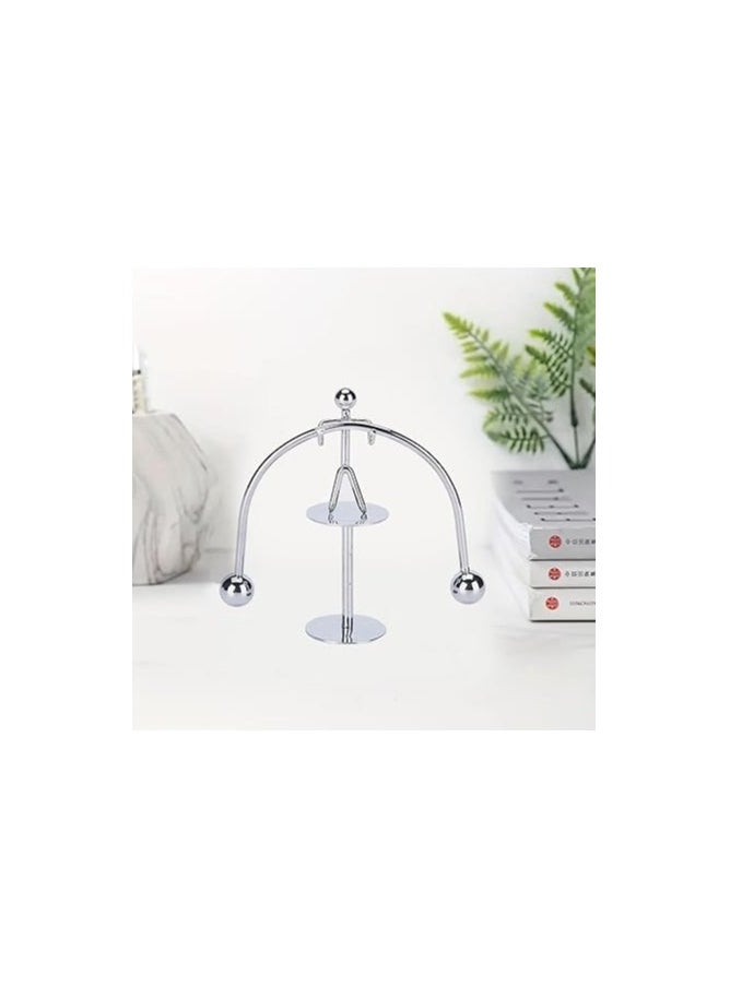Generic - "Enjoy an experience of balance and calm with the Newton's Cradle - elegant design, smooth movement, and a clever decorative touch that adds a sophisticated scientific touch to your office or home. " - Image 1