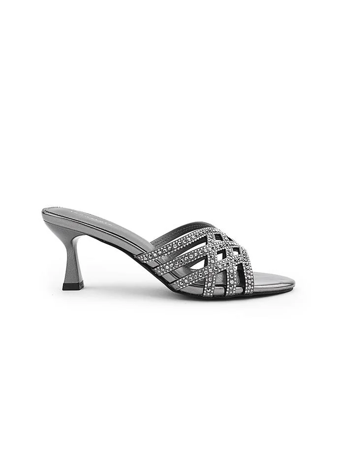 أيقون Elegant heel slipper with secure ankle strap.