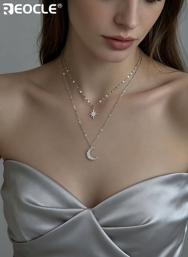 ريوكل قلادة نسائية متعددة الطبقات بتصميم نجمة وهلال سلسلة قابلة للتكديس من طبقتين مزينة بنجوم وهلالات لامعة مناسبة للارتداء اليومي والمناسبات والحفلات. - Image 1