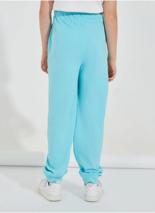 Styli Tapered Cuffed Joggers with Drawstrings