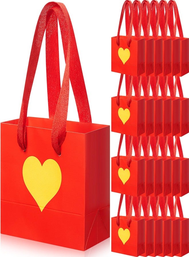 Weekgrat 24 Pcs Mini Valentine Gift Bags with Handle 4.72 x 3.94 x 2.36 Inch Small Heart Shaped Pattern Treat Goodie Candy Bags Bulk for Valentine Party Supplies Decoration (Red and Gold) - Image 1