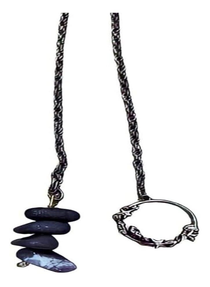 Black stone pendulum used in magnetic hypnosis