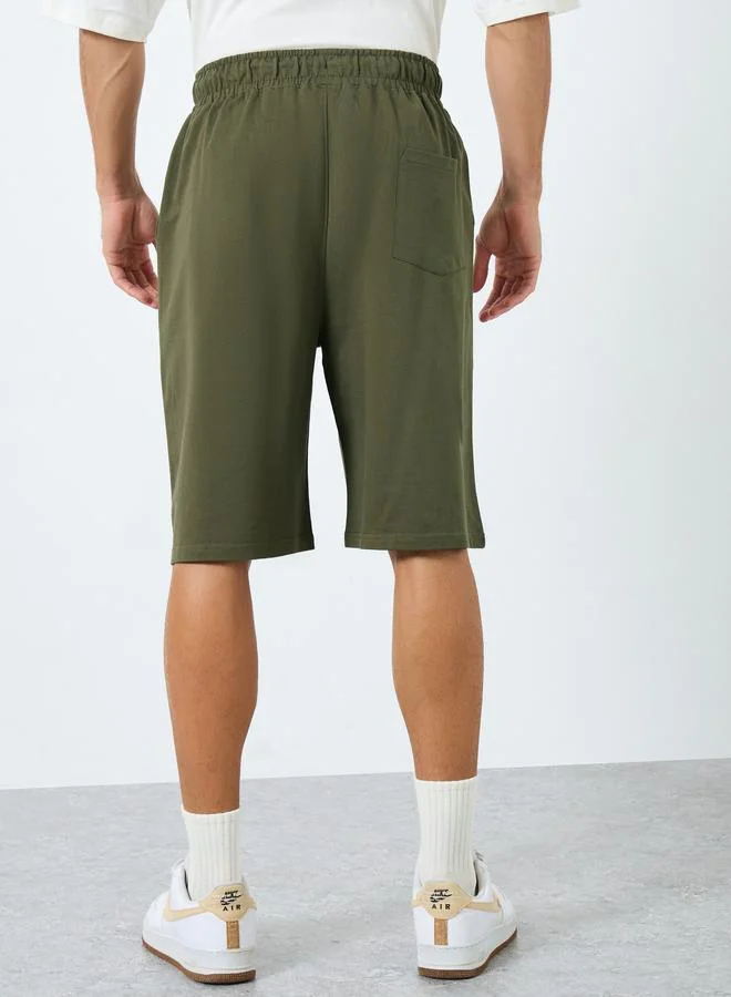 Styli Styli Solid Oversized Shorts with Drawstring
