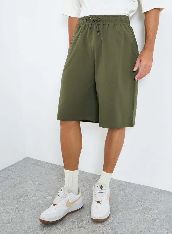 Styli Styli Solid Oversized Shorts with Drawstring