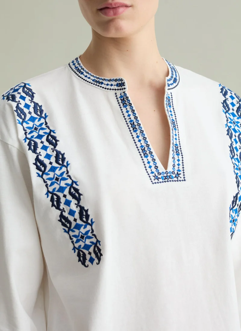 او في اس أبيض