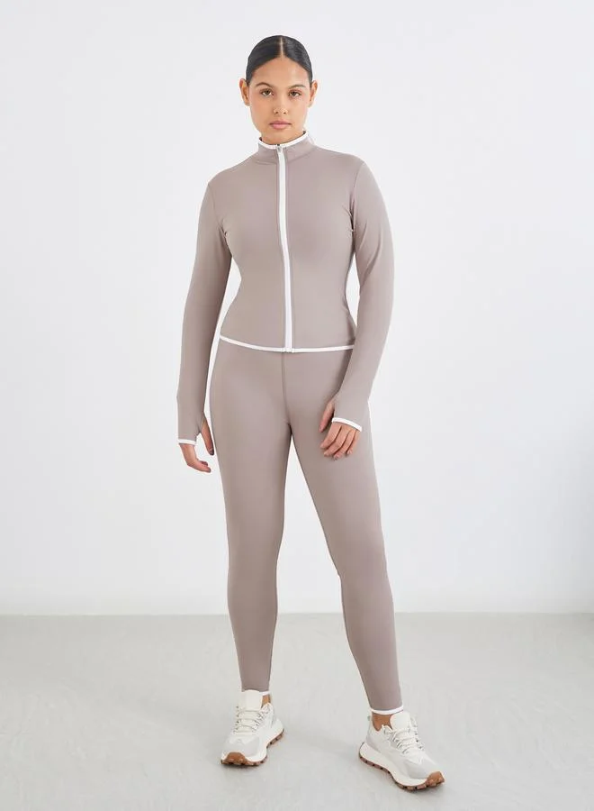 ستايلي اكتيف طقم جاكيت وسروال ضيق بسحاب وخطوط متباينة