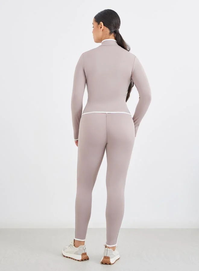 Styli Active  Contrast Piping Zip-Up Jacket and Leggings Set for Women | Best Price UAE