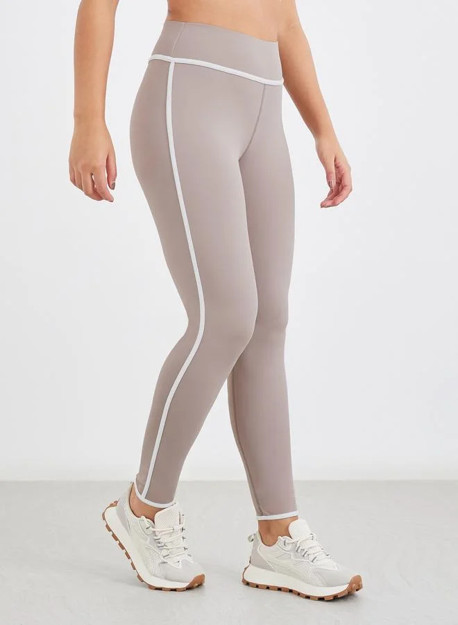 Styli Active  Contrast Piping Zip-Up Jacket and Leggings Set for Women | Best Price UAE
