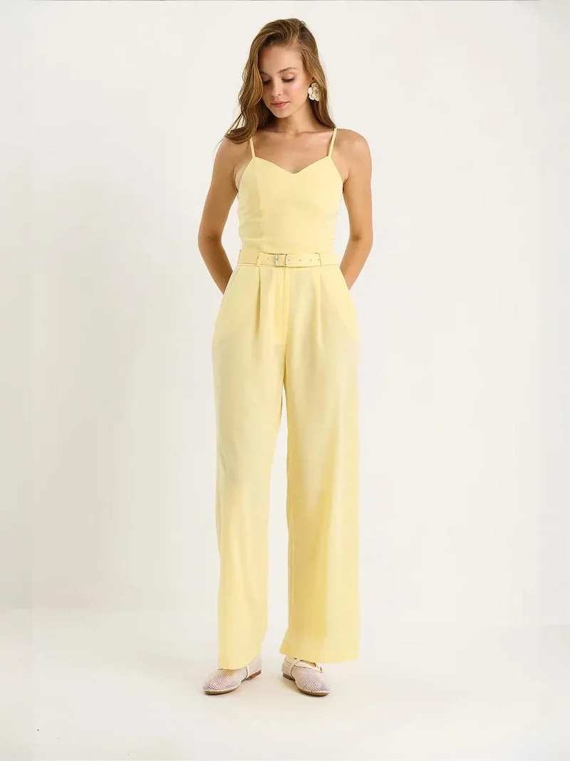 بيانكو لوتشي طقم بلوزة بياقة على شكل حرف  وبنطلون واسع الساق