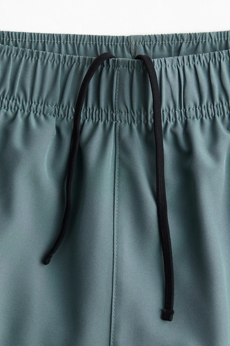 H&M Fast-drying sports shorts