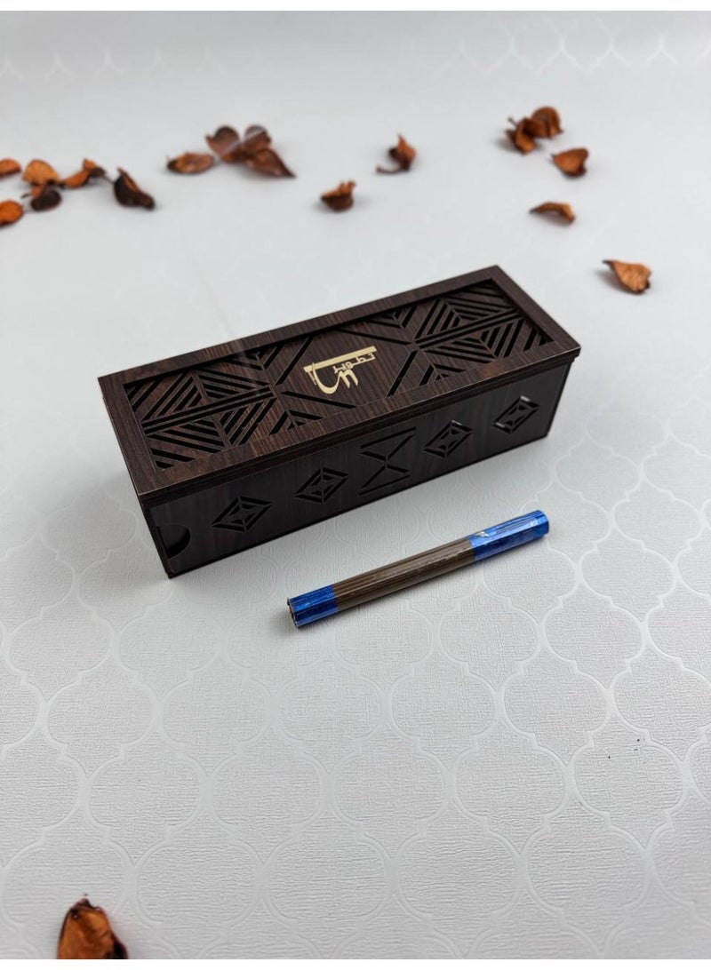 Samrix The Abaq Al Dar incense burner is a wooden burner with acrylic decorations. It includes a drawer at the bottom for storing incense sticks (30 sticks included) and a top compartment for lighting the sticks. It is safe, non-flammable, and has a magnetic closure. - Image 2