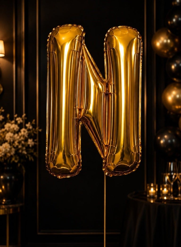 بالون حرف  "N" ذهبي فاخر بتصميم لامع، مناسب لتزيين حفلات عيد الميلاد والمناسبات الخاصة بأجواء أنيقة وجذابة. - Image 1