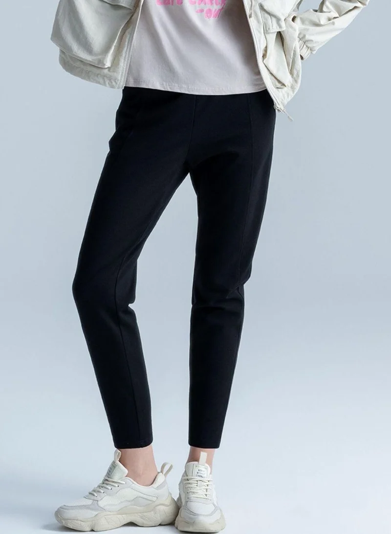 جيوردانو بنطلون كابري نسائي بخصر عالٍ بقصة عادية من نسيج إنترلوك مطاطي