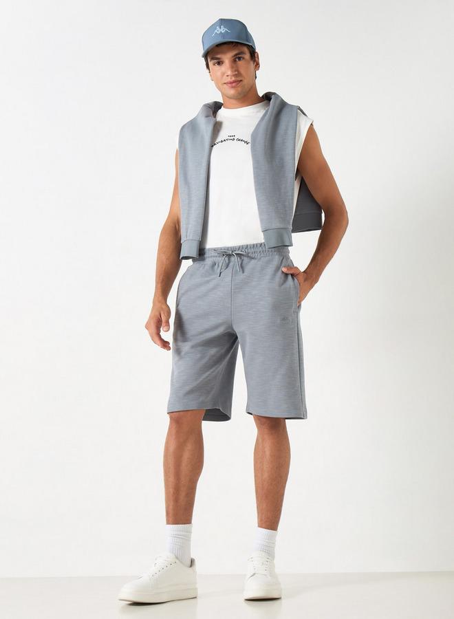 كابا شورت بتطريز شعار ورباط إغلاق وجيوب من كابا - Image 2