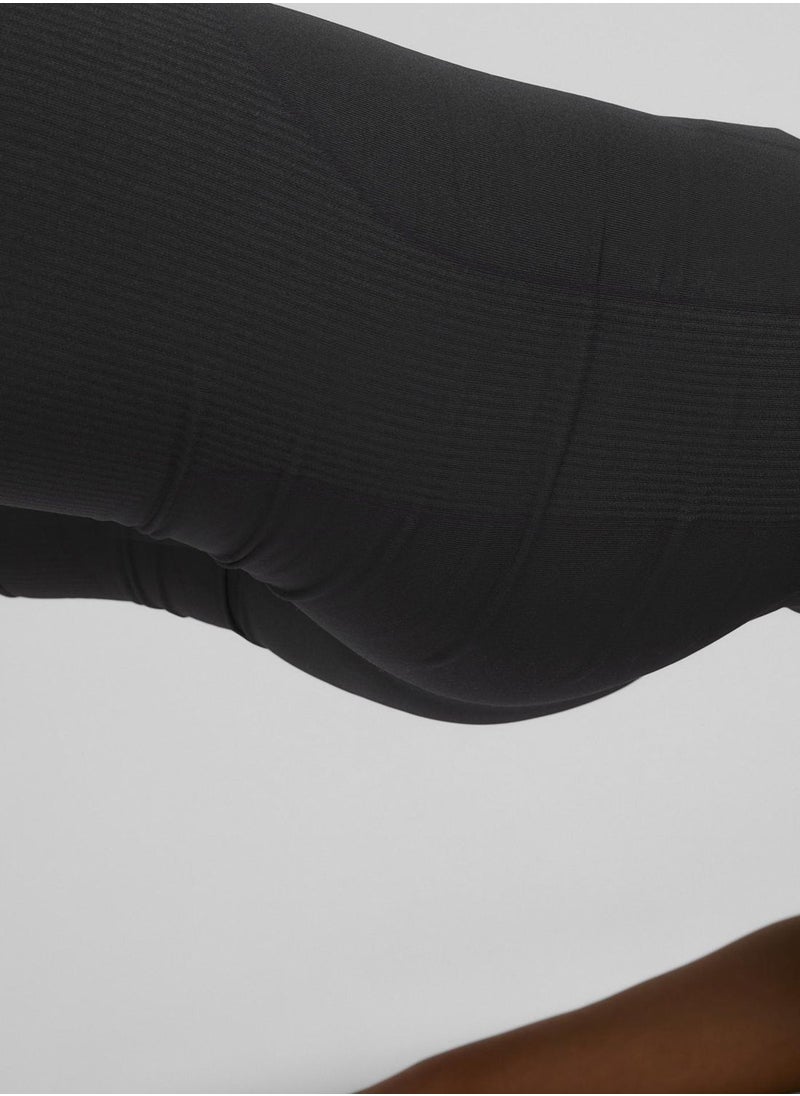 PUMA - Evoknit 7" Short Tights - Image 1