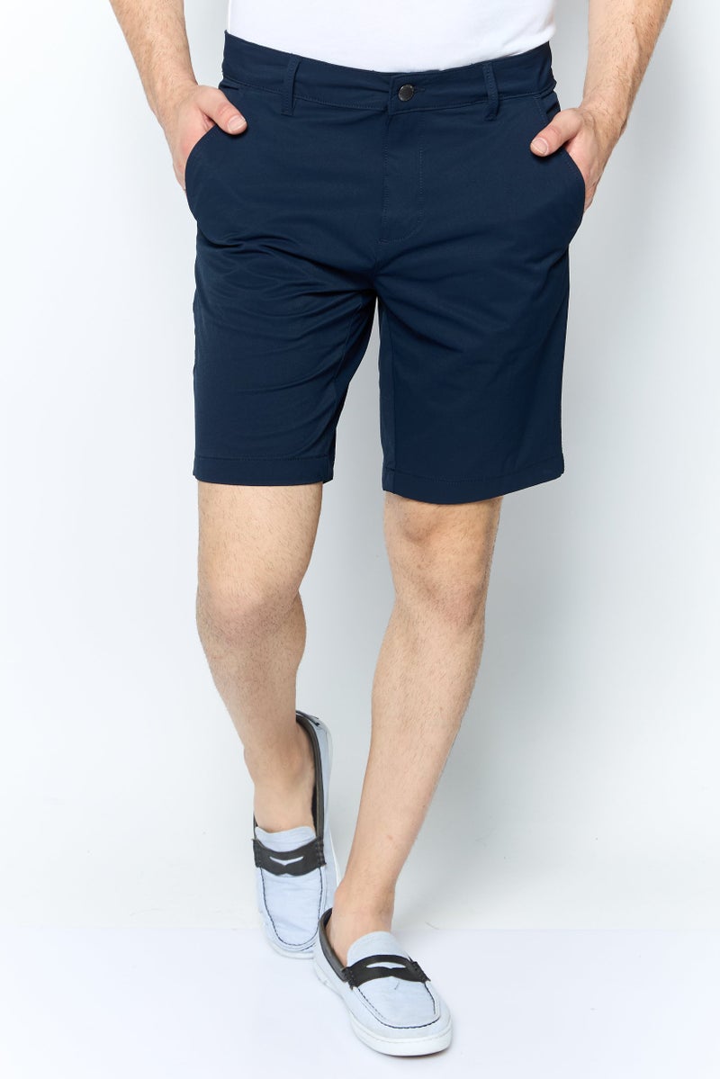 VINCE CAMUTO شورتات تشينو صلبة للرجال، كحلي - Image 1