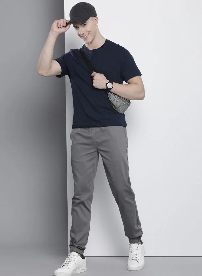 شركة المرآب الهندية Men Slim Fit Solid Mid-Rise Stretchable Chino Joggers
