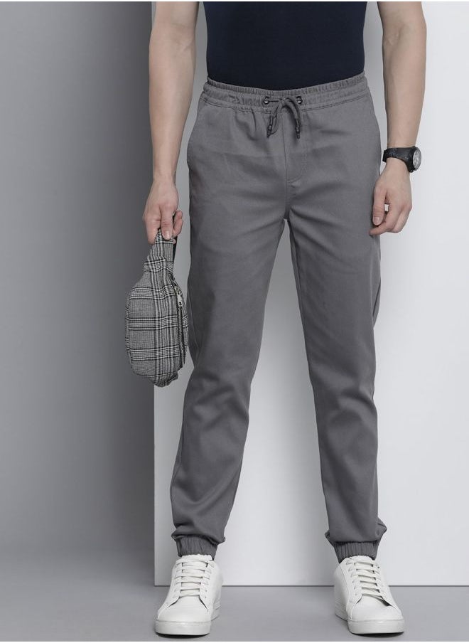 The Indian Garage Co Men Slim Fit Solid Mid-Rise Stretchable Chino Joggers  - Image 1