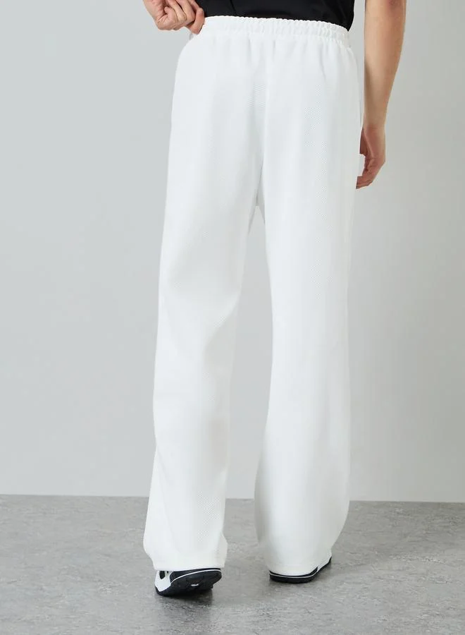 Styli White Men White Embroidered Relaxed Fit Joggers for Men | Best Price UAE
