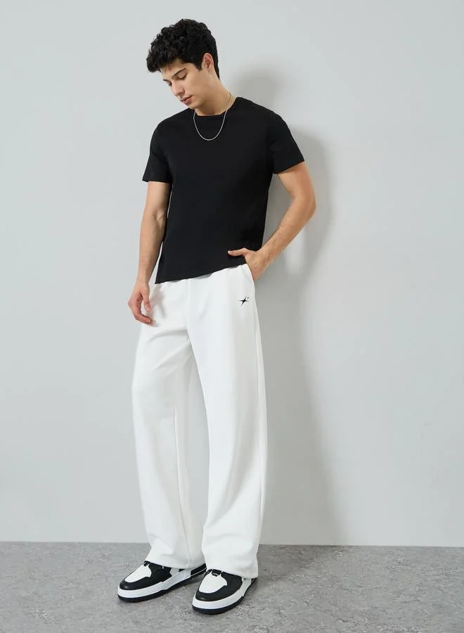 Styli White Men White Embroidered Relaxed Fit Joggers for Men | Best Price UAE
