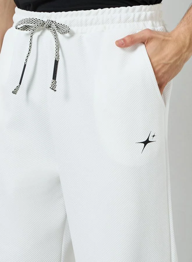 Styli White Men White Embroidered Relaxed Fit Joggers for Men | Best Price UAE
