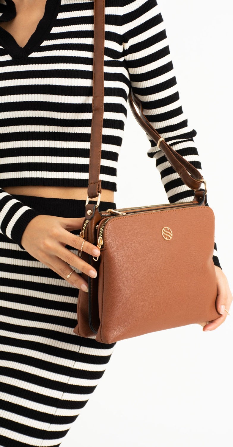 Sanmorris Women's Faux Leather Adjustable Cross Strap Shoulder Bag with 4 Compartments and Metal Zipper  - Image 1