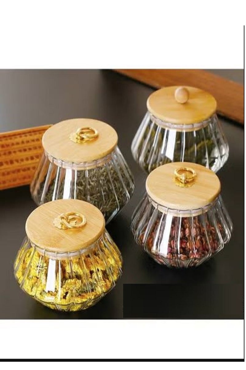 Glass jars with airtight wooden lids that are BPA-free, ideal for storing food, cookies, coffee, and nuts. They are recyclable and feature long-lasting food preservation. - Image 1