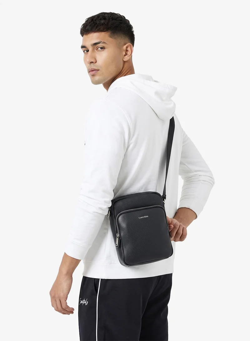 Calvin Klein  Textured Logo Crossbody Reporter Bag for Men | Best Price UAE