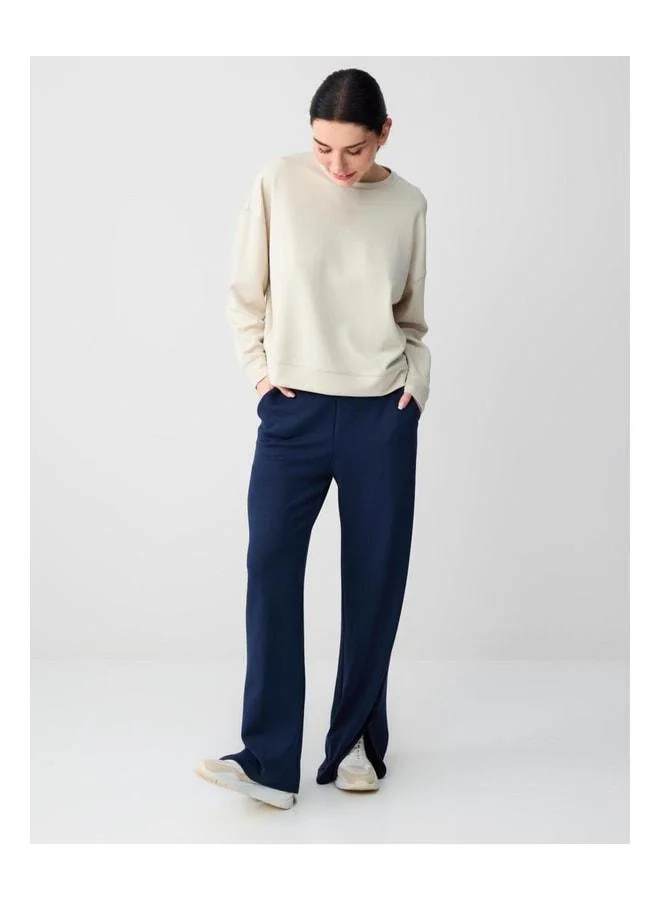 Jimmy Key Navy High-Waist Wide-Leg Pocket Detailed Knit Pants.