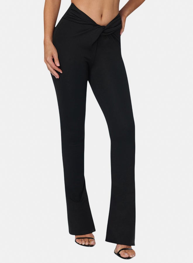 bebe Twisted Waist Flared Leg Pant - Image 1