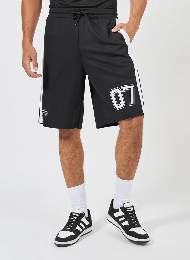 Styli Printed Oversized Varsity V Neck T-Shirt & Shorts Co-Ords