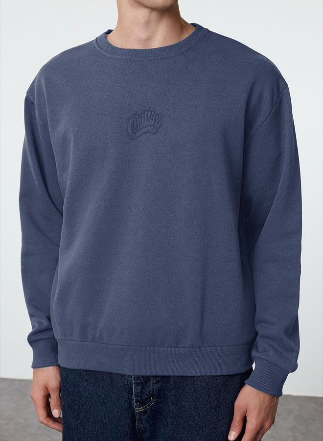 trendyol Indigo Oversize/Wide Cut Embossed Text Printed Inside Polar Fleece Sweatshirt TMNAW25SW00053 - Image 1
